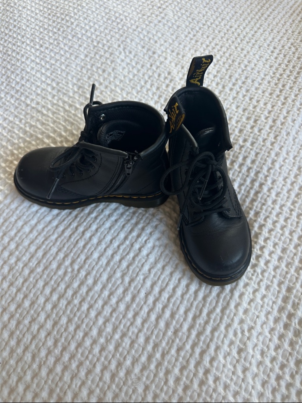 Dr. Martens Kids Black Lace-Up Ankle Boots with Yellow Stitching
